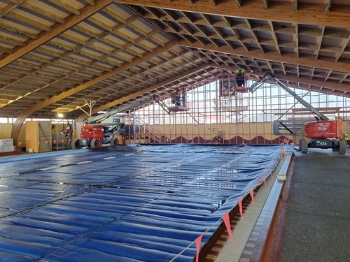 Hokitika Swimming Pool with contractors working in the ceiling - September 2021